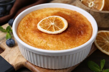 Tasty semolina cake served on wooden table, closeup