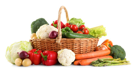 Different ripe vegetables in basket isolated on white