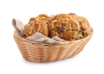 Tasty cookies with nuts in wicker basket isolated on white
