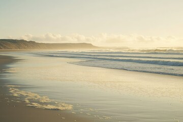 Fototapeta premium Tranquil Beach with Soft Ocean Waves at Sunrise