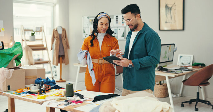 Decision, creative and tablet with fashion designer people in textile workshop together. Clothing industry, conversation and planning with styling team in office for manufacturing or production