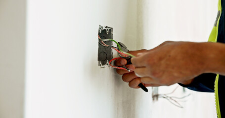 Man, hands and wires on construction site for renovation, connection or electrician with tools....