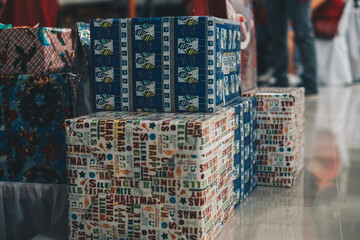 Several Christmas gift boxes in various sizes, colors and designs. Selective focus. Copy space.