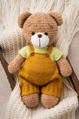 Handmade crocheted bear toy, amigurumi. Handmade stuffed toys. 