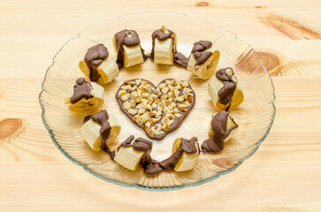 Chocolate fondue with fresh banana, selective focus