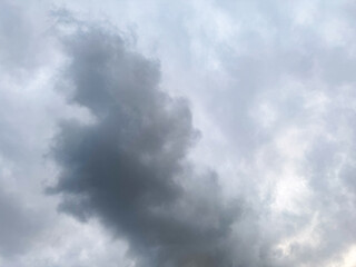 Big clouds floating in the sky Forming together into rain clouds in the afternoon