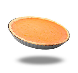 Delicious homemade pumpkin pie in air on white background