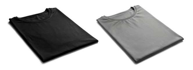 Grey and black folded t-shirts isolated on white. Mockup for design