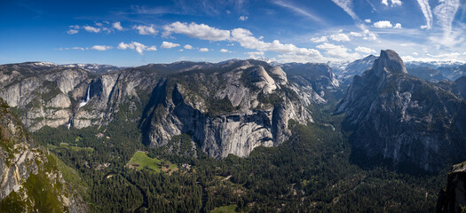 Panorama from glacier point over Yosemite valley with half dome, royal arches and Yosemite falls