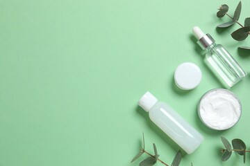 Natural cosmetic products on color background, top view