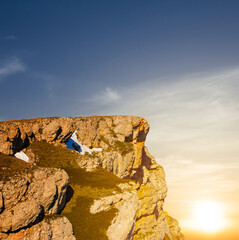 closeup rocky cliff  at the dramatic sunset