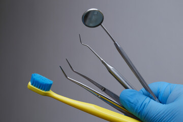 Hand instruments used in dental treatments to clean decayed tissues in the tooth structure and to remove stains from tooth surfaces. dental treatment dental before after © UniqDream