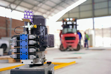 Mechatronic equipment for vehicle inspection with a blurred background