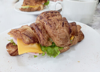 Fresh cuarasão with cheese and herbs on a white plate