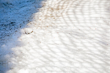 shadow from the protective net on the downhill slope. safe holiday