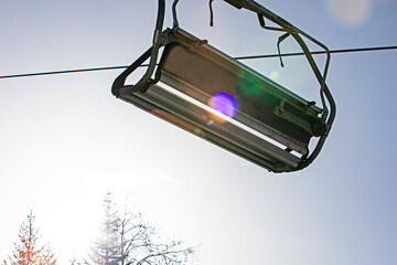 ski lift without people on a sunny day on the slope. Leisure. school break