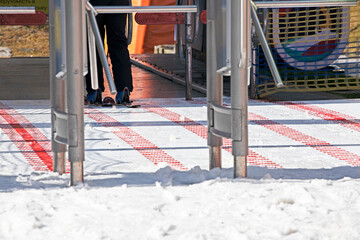 entrance to the ski lift in the morning. Active family vacation