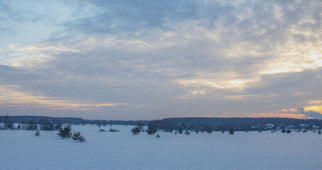 Snowy landscape with a few trees and a cloudy sky