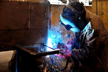 welder welding steel