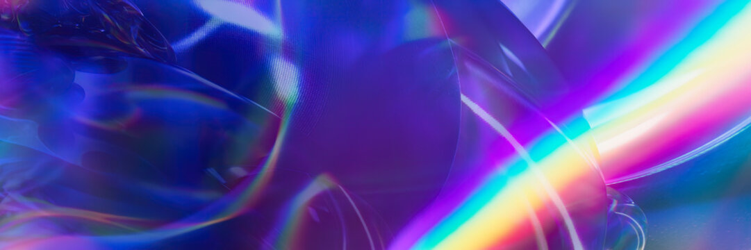 Abstract neon light refractions on a smooth surface