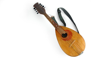 Fototapeta premium Mandolin isolated on a white background. Baroque string musical instrument.