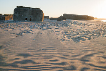 bunkers in denmark from world war II in the evening light