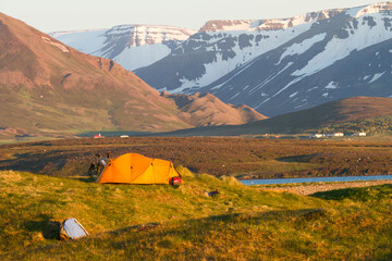 two tents in the shine of the midnight sun in iceland