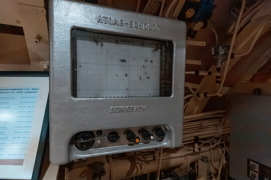 26 October 2024, Tivat, Montenegro: Vintage atlas echolot displaying sonar data inside the control room of a submarine, highlighting historical navigation technology