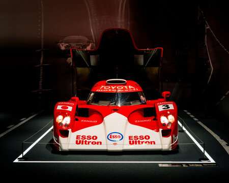 FUJI, JAPAN - 23 NOVEMBER 2024: ON DISLPAY AT THE FUJI SPEEDWAY MOTOR MUSEUM, VINTAGE MOTORSPORT ICON, THE 1999 TOYOTA GT-ONE LE MANS RACE CAR IN RED AND WHITE PAINT WITH ESSO SPONSORSHIP