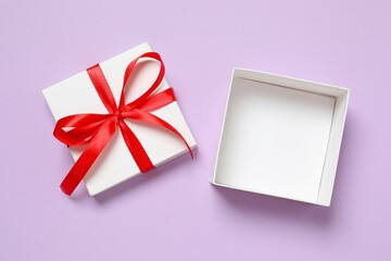 Beautiful gift box on color background