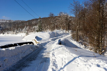 Mountain road covered with snow