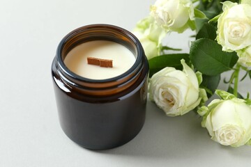 Handmade scented candle in a glass. Soy wax candle with a wooden wick