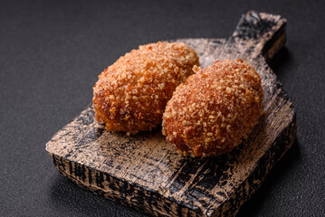 Delicious fresh cutlet or meatball Kiev style with filling