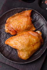 Chicken thighs fried with salt, spices and herbs