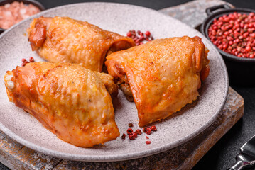Chicken thighs fried with salt, spices and herbs