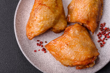 Chicken thighs fried with salt, spices and herbs