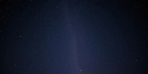Fototapeta premium A stunning view of a starry night sky filled with twinkling stars and galaxies, darkness, deep space