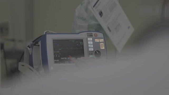 Doctor monitors vital signs