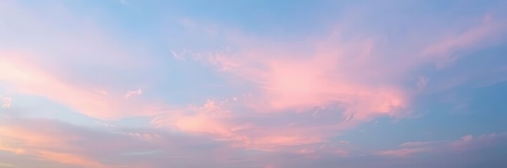 Fototapeta premium Soft and dreamy gradient background in pink, blue, and yellow hues resembling a fuzzy sunset sky, background, pastel