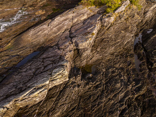 Sunlit Rocky Shoreline Along Vancouver Island’s West Coast