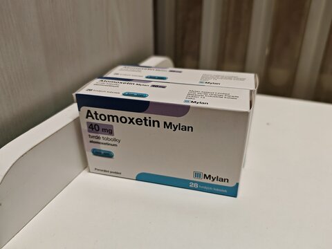 Prague,Czech Republic-August 7 2024: ATOMOXETIN MYLAN box of medication with ATOMOXETINE active substance by MYLAN,used for treatment of ADHD.	
