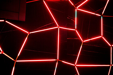 modern geometric luminous shapes on a dark background in the interior. Electricity savings
