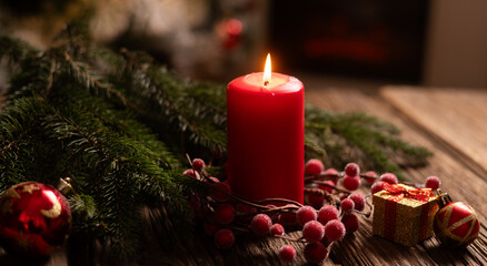  red Christmas Candle on rustic wood