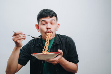 Deliciously Savoring Noodles: A Food Lover’s Joyful Moment Captured in Time