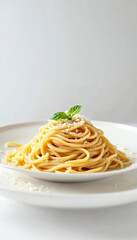 Classic Italian Spaghetti with Parmesan and Fresh Basil on Plate