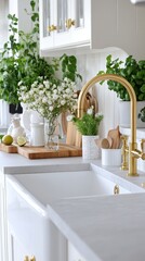A contemporary kitchen showcases a black sink paired with brass fixtures on a marble countertop. Soft lighting highlights the elegant design elements and clean lines
