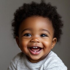 Stunning high resolution photos of an African American toddler with a happy expression, in a casual setting. Art session
