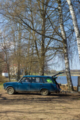 Man in the trunk of a car. Peterhof. Saint Petersburg