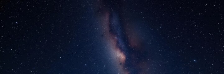 Fototapeta premium A mesmerizing night sky filled with twinkling stars on a deep black background, milky way, night sky, glowing