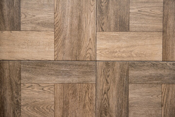 Textured ceramic tiles imitating wooden parquet